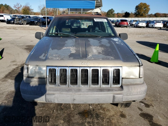 1997 Jeep Grand Cherokee TSi with VIN 1J4FX58S4VC516340, listed as a Copart auction lot 84409044 with 256,300 mi miles and Clean Title. Bid and sale history available at carsss.com. Image 5.