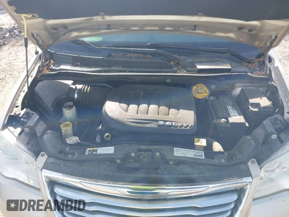 2015 Chrysler Town & Country Touring with VIN 2C4RC1BG7FR583213, listed as a IAAI auction lot 42089075 with 265,629 mi miles. Bid and sale history available at carsss.com. Image 10.