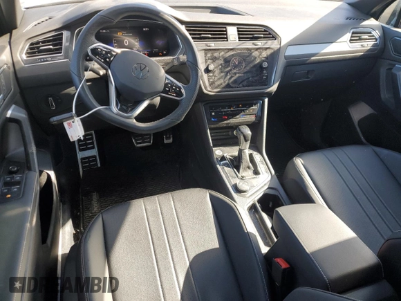 2023 Volkswagen Tiguan SE R-Line Black with VIN 3VV8B7AX2PM108307, listed as a Copart auction lot 43910665 with 21,448 mi miles and Salvage Title. Bid and sale history available at DreamBid. Image 8.