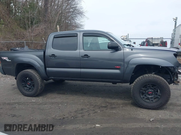 2011 Toyota Tacoma with VIN 3TMLU4EN1BM067901, listed as a IAAI auction lot 42043408 with 186,499 mi miles and . Bid and sale history available at carsss.com. Image 13.