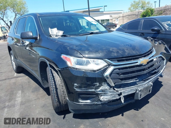 2019 Chevrolet Traverse LS z VIN 1GNERFKW3KJ222388, wystawiony jako IAAI lot #42225444 z przebiegiem 94 777 mil mil oraz . Historia ofert i sprzedaży dostępna na DreamBid. Obrazek 1.