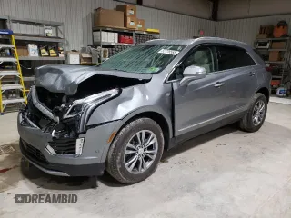2023 Cadillac XT5 AWD Premium Luxury with VIN 1GYKNDRS5PZ221261, listed as a Copart auction lot 52779565 with 7,098 mi miles and Salvage Title. Bid and sale history available at DreamBid. Image 1.