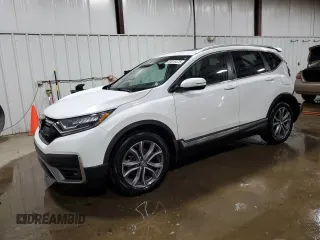 2021 Honda CR-V Touring z VIN 5J6RW2H96ML015699, wystawiony jako Copart lot #60616475 z przebiegiem 46 297 mil mil oraz Szkoda całkowita • Salvage title. Historia ofert i sprzedaży dostępna na DreamBid. Obrazek 1.