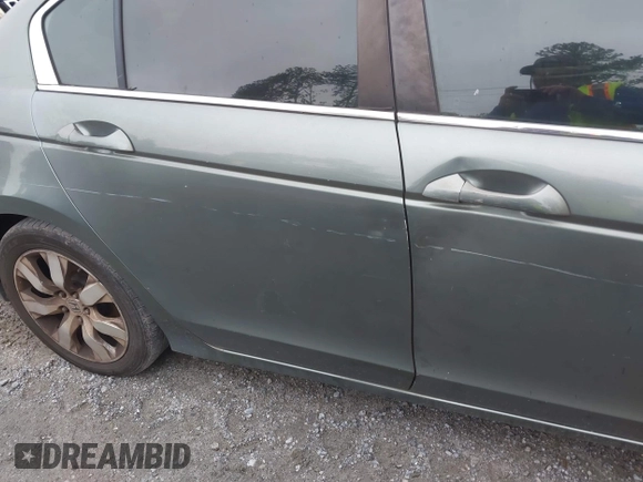 2009 Honda Accord EX z VIN 1HGCP26799A092601, wystawiony jako IAAI lot #42360755 z przebiegiem 298 069 mil mil oraz . Historia ofert i sprzedaży dostępna na DreamBid. Obrazek 13.
