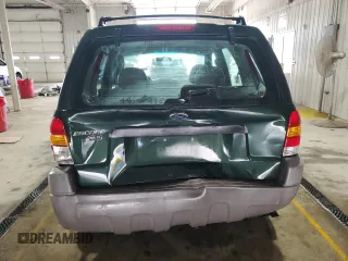 2002 Ford Escape XLS Value with VIN 1FMYU01B32KC48043, listed as a Copart auction lot 63011005 with 167,185 mi miles and Salvage title. Bid and sale history available at DreamBid. Image 6.