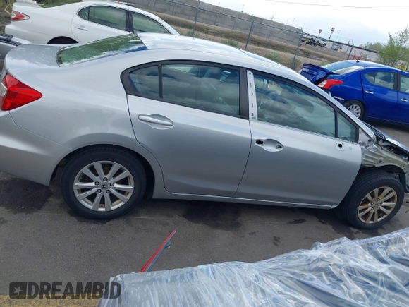 2012 Honda Civic EX with VIN 2HGFB2F81CH610374, listed as a IAAI auction lot 42019951 with 109,835 mi miles and . Bid and sale history available at DreamBid. Image 14.