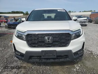 2023 Honda Passport EX-L with VIN 5FNYF8H58PB024039, listed as a Copart auction lot 57269725 with 44,705 mi miles and Salvage title. Bid and sale history available at DreamBid. Image 5.