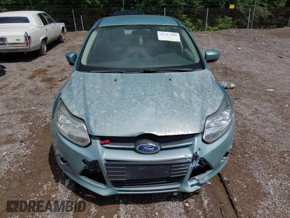 2012 Ford Focus SE with VIN 1FAHP3F25CL261609, listed as a IAAI auction lot 42517968 with 169,109 mi miles and . Bid and sale history available at DreamBid. Image 6.