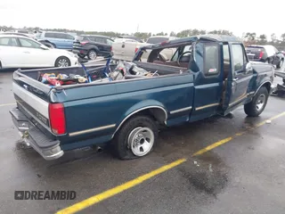 1995 Ford F-150 with VIN 1FTEX15N8SKB65989, listed as a IAAI auction lot 41132069 with 1 mi miles. Bid and sale history available at carsss.com. Image 4.