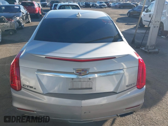 2015 Cadillac CTS AWD z VIN 1G6AW5SX2F0104981, wystawiony jako IAAI lot #41276740 z przebiegiem 87 128 mil mil oraz . Historia ofert i sprzedaży dostępna na DreamBid. Obrazek 16.