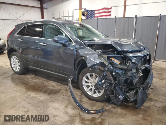 2021 Cadillac XT4 AWD Luxury with VIN 1GYFZBR49MF074936, listed as a Copart auction lot 66884034 with 38,695 mi miles and Salvage Title. Bid and sale history available at carsss.com. Image 4.