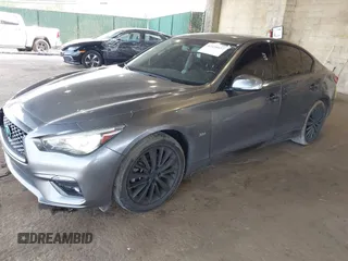 2019 Infiniti Q50 Luxe z VIN JN1EV7AR8KM594171, wystawiony jako IAAI lot #42428037 z przebiegiem 70 086 mil mil oraz . Historia ofert i sprzedaży dostępna na DreamBid. Obrazek 17.