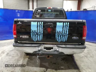 1999 Ford F-250 XL with VIN 1FTNX21SXXEE02893, listed as a Copart auction lot 75717534 with 127,574 mi miles and Clean title. Bid and sale history available at DreamBid. Image 6.
