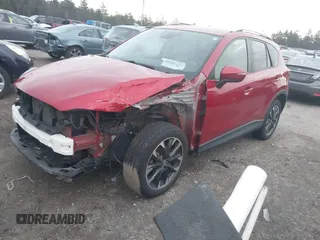 2016 Mazda CX-5 Grand Touring with VIN JM3KE4DY6G0740347, listed as a IAAI auction lot 41101437 with 81,586 mi miles. Bid and sale history available at carsss.com. Image 2.