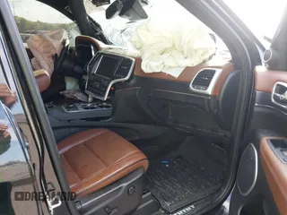 2018 Jeep Grand Cherokee Summit with VIN 1C4RJFJT5JC120523, listed as a IAAI auction lot 42136651 with 75,699 mi miles and . Bid and sale history available at DreamBid. Image 5.