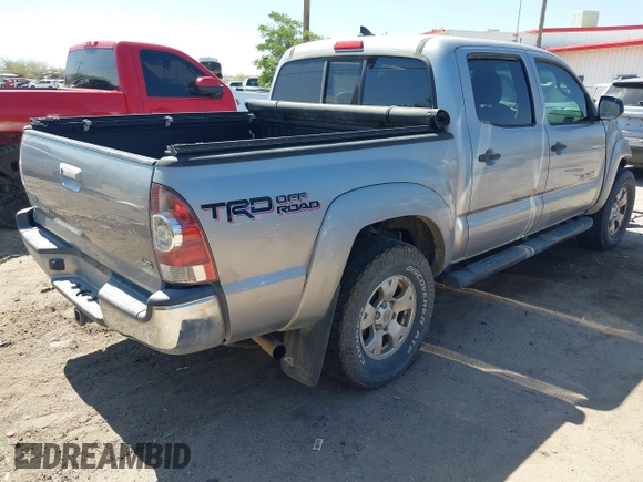 2015 Toyota Tacoma with VIN 3TMLU4EN6FM188736, listed as a IAAI auction lot 42605859 with 210,717 mi miles and . Bid and sale history available at DreamBid. Image 4.