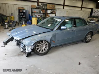 2004 Jaguar XJ with VIN SAJWA71C34SG29145, listed as a Copart auction lot 45932635 with 133,888 mi miles and Salvage Title. Bid and sale history available at carsss.com. Image 1.