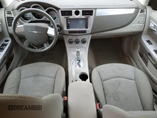 2007 Chrysler Sebring Touring with VIN 1C3LC56R57N660866, listed as a Copart auction lot 49726145 with 121,709 mi miles and Salvage Title. Bid and sale history available at DreamBid. Image 8.