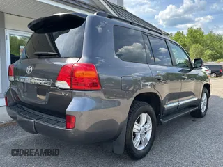 2013 Toyota Land Cruiser z VIN JTMHY7AJ8D4016294, wystawiony jako Copart lot #59005355 z przebiegiem 199 983 mil mil oraz Tytuł czysty. Historia ofert i sprzedaży dostępna na DreamBid. Obrazek 4.