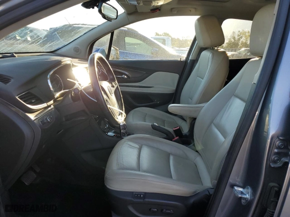 2019 Buick Encore Essence with VIN KL4CJCSM2KB749749, listed as a Copart auction lot 49124835 with 59,616 mi miles and Salvage Title. Bid and sale history available at carsss.com. Image 7.