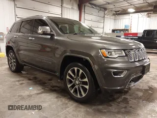 2017 Jeep Grand Cherokee Overland z VIN 1C4RJFCG6HC641812, wystawiony jako IAAI lot #42053404 z przebiegiem 129 184 mil mil oraz . Historia ofert i sprzedaży dostępna na DreamBid. Obrazek 1.