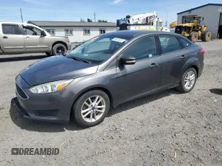 2017 Ford Focus SE z VIN 1FADP3F23HL232938, wystawiony jako Copart lot #58076225 z przebiegiem 68 870 mil mil oraz Szkoda całkowita • Salvage title. Historia ofert i sprzedaży dostępna na DreamBid. Obrazek 1.