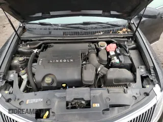 2015 Lincoln MKS with VIN 1LNHL9DK7FG606935, listed as a Copart auction lot 81991384 with 82,097 mi miles and Salvage Title. Bid and sale history available at carsss.com. Image 12.