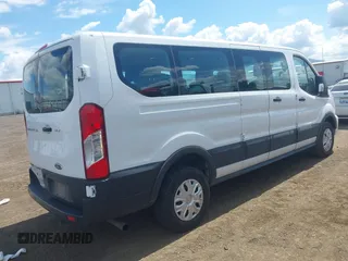 2021 Ford Transit Passenger XL z VIN 1FBAX2Y87MKA31170, wystawiony jako IAAI lot #42348150 z przebiegiem 60 124 mil mil oraz . Historia ofert i sprzedaży dostępna na DreamBid. Obrazek 4.