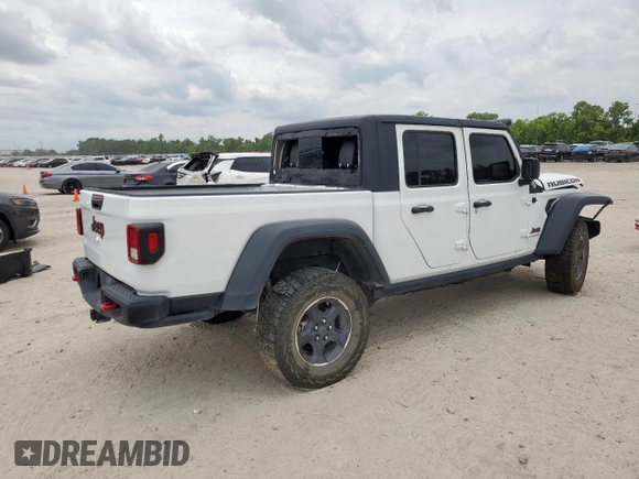 2023 Jeep Gladiator Rubicon with VIN 1C6JJTBG8PL532271, listed as a Copart auction lot 58220565 with 34,172 mi miles and Salvage title. Bid and sale history available at DreamBid. Image 3.