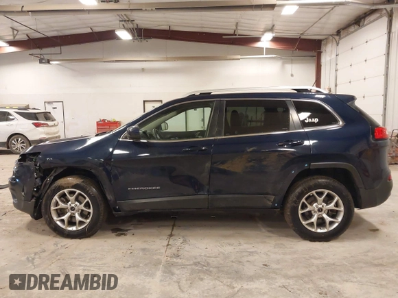 2014 Jeep Cherokee Latitude with VIN 1C4PJMCS9EW239549, listed as a IAAI auction lot 41156954 with 167,331 mi miles and . Bid and sale history available at DreamBid. Image 14.