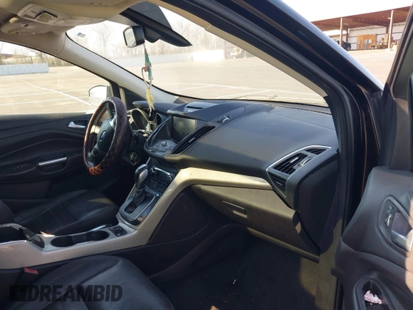 2013 Ford Escape SEL with VIN 1FMCU9H95DUA46183, listed as a IAAI auction lot 41903684 with 243,026 mi miles. Bid and sale history available at carsss.com. Image 5.