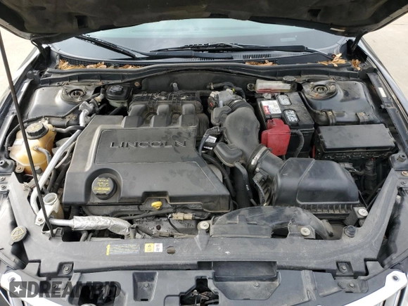 2012 Lincoln MKZ with VIN 3LNHL2JC3CR828543, listed as a Copart auction lot 56451355 with 127,865 mi miles and Salvage title. Bid and sale history available at DreamBid. Image 11.