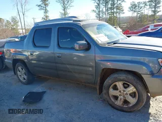 2010 Honda Ridgeline RTL with VIN 5FPYK1F52AB004678, listed as a IAAI auction lot 41661968 with 169,021 mi miles. Bid and sale history available at carsss.com. Image 13.