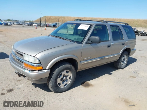 2003 Chevrolet Blazer LS z VIN 1GNDT13X63K146670, wystawiony jako IAAI lot #42200426 z przebiegiem 129 516 mil mil oraz . Historia ofert i sprzedaży dostępna na DreamBid. Obrazek 2.