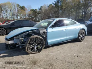 2023 Porsche Taycan with VIN WP0AA2Y11PSA11164, listed as a Copart auction lot 50695385 with 23,833 mi miles and Salvage Title. Bid and sale history available at DreamBid. Image 1.