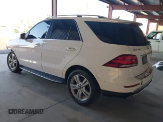 2016 Mercedes-Benz GLE 350 with VIN 4JGDA5JBXGA710342, listed as a IAAI auction lot 41012189 with 128,325 mi miles and . Bid and sale history available at DreamBid. Image 3.