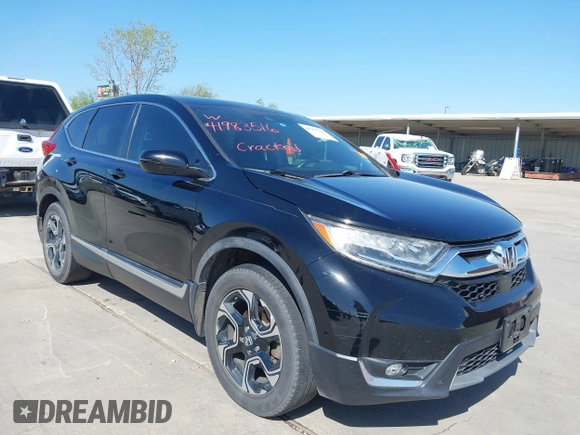 2018 Honda CR-V Touring with VIN 2HKRW2H91JH630702, listed as a IAAI auction lot 41983516 with 84,355 mi miles. Bid and sale history available at carsss.com. Image 1.