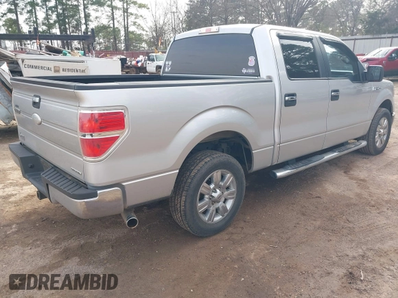 2012 Ford F-150 XL with VIN 1FTFW1CF5CFB63372, listed as a IAAI auction lot 41747703 with 202,219 mi miles. Bid and sale history available at carsss.com. Image 4.