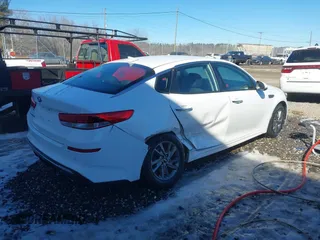 2019 Kia Optima LX with VIN 5XXGT4L33KG339985, listed as a IAAI auction lot 41218499 with 119,007 mi miles. Bid and sale history available at carsss.com. Image 4.
