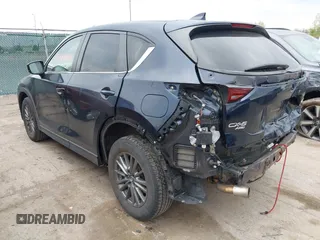 2017 Mazda CX-5 Touring with VIN JM3KFBCL2H0213740, listed as a IAAI auction lot 42165094 with 112,240 mi miles and . Bid and sale history available at DreamBid. Image 3.