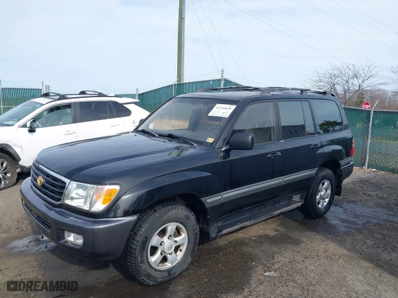 1998 Toyota Land Cruiser with VIN JT3HT05J2W0017214, listed as a IAAI auction lot 41716028 with 214,047 mi miles. Bid and sale history available at carsss.com. Image 18.