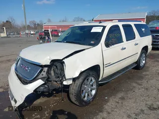 2010 GMC Yukon XL Denali with VIN 1GKUKMEF6AR157775, listed as a IAAI auction lot 41521509 with 201,836 mi miles. Bid and sale history available at carsss.com. Image 17.