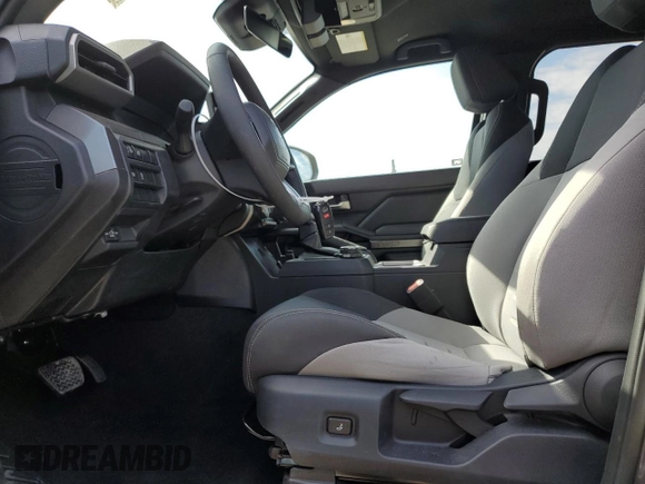 2025 Toyota Tacoma SR with VIN 3TMLB5JNXSM095729, listed as a Copart auction lot 46190185 with 921 mi miles and Salvage Title. Bid and sale history available at DreamBid. Image 7.