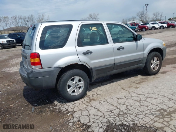 2007 Ford Escape XLS with VIN 1FMYU02Z97KB80446, listed as a IAAI auction lot 42113186 with 128,492 mi miles. Bid and sale history available at carsss.com. Image 4.