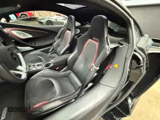 2023 McLaren GT z VIN SBM22GCA3PW002548, wystawiony jako Copart lot #52157855 z przebiegiem 779 mil mil oraz Szkody całkowita. Historia ofert i sprzedaży dostępna na DreamBid. Obrazek 5.