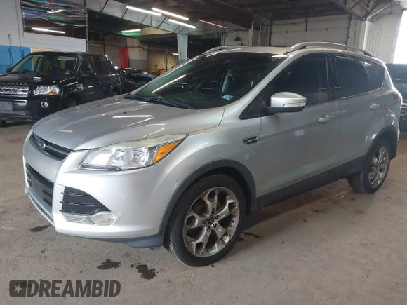 2015 Ford Escape Titanium z VIN 1FMCU9J96FUB23902, wystawiony jako IAAI lot #42497188 z przebiegiem 164 452 mil mil oraz . Historia ofert i sprzedaży dostępna na DreamBid. Obrazek 17.