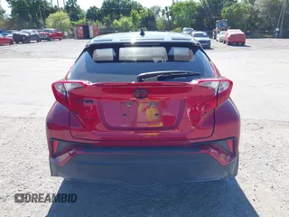 2020 Toyota C-HR LE with VIN JTNKHMBX3L1066720, listed as a IAAI auction lot 42042139 with 98,925 mi miles and . Bid and sale history available at DreamBid. Image 16.
