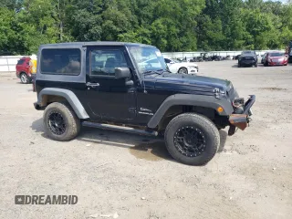 2012 Jeep Wrangler Sport z VIN 1C4AJWAG2CL245174, wystawiony jako Copart lot #63161425 z przebiegiem 136 626 mil mil oraz Czysty tytuł • Clean title. Historia ofert i sprzedaży dostępna na DreamBid. Obrazek 4.
