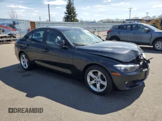 2014 BMW 3 Series 328i xDrive with VIN WBA3B3C58EJ977546, listed as a Copart auction lot 53090185 with 134,823 mi miles and Salvage Title. Bid and sale history available at DreamBid. Image 4.