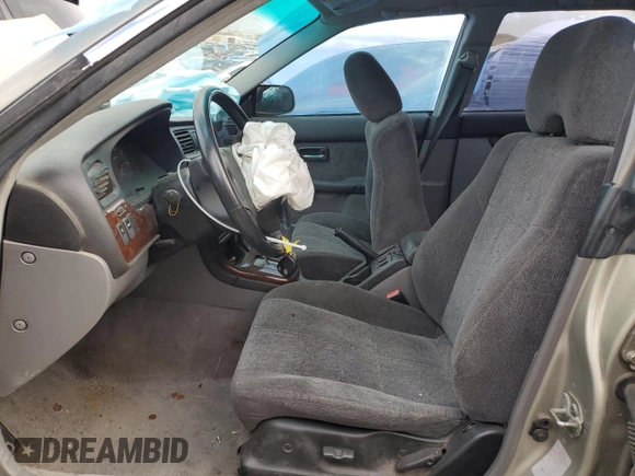 2000 Subaru Legacy with VIN 4S3BH6452Y7306601, listed as a Copart auction lot 67319954 with 276,584 mi miles and Salvage title. Bid and sale history available at DreamBid. Image 7.